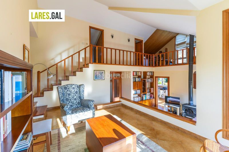 Foto 409e9166-58ba-43f2-8860-9c379cdb8ad8. Chalet casa de piedra en serra poñente con jardín en Cangas