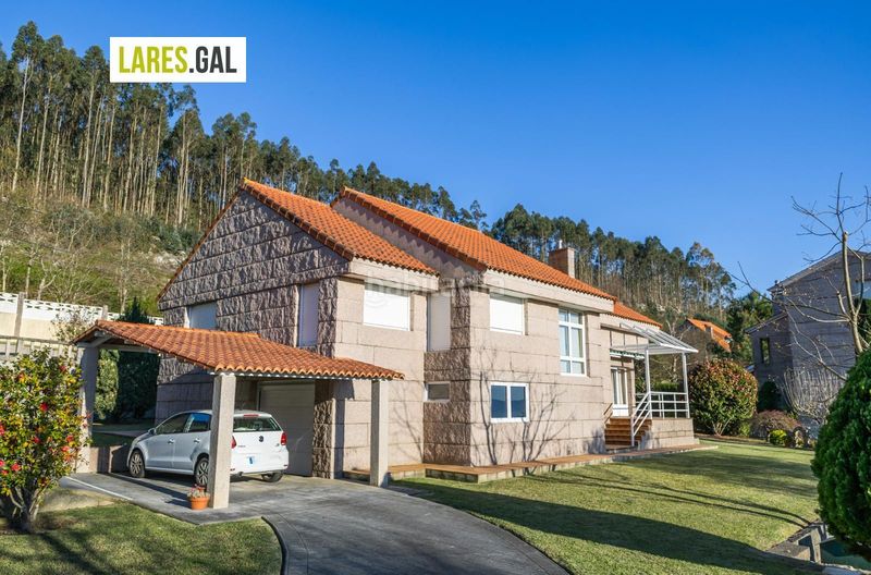 Foto 41a1acdb-f7be-43ef-8fcb-c7ef2b6d53b5. Chalet casa de piedra en serra poñente con jardín en Cangas