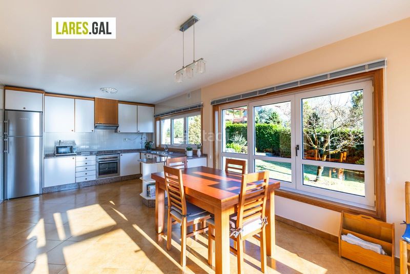 Foto 456c5aeb-0735-4d62-9073-bfff9a426868. Chalet casa de piedra en serra poñente con jardín en Cangas