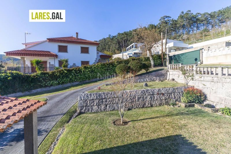 Foto 625c5706-cad1-4241-8d00-d814ef418fe6. Chalet casa de piedra en serra poñente con jardín en Cangas