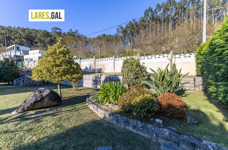 Foto 70621586-2f4c-47e2-8856-68d37671591e. Chalet casa de piedra en serra poñente con jardín en Cangas