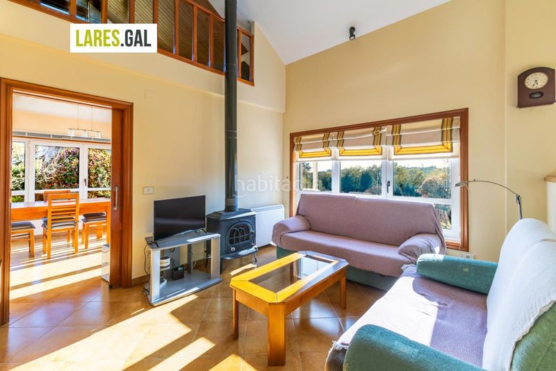 Foto 9826df13-dca3-4fae-8c34-40d8d825eb1d. Chalet casa de piedra en serra poñente con jardín en Cangas