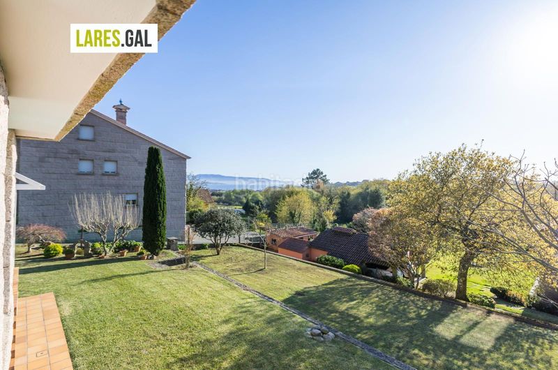 Foto b8ea31ce-4a6a-4742-90e7-4678160a7ba2. Chalet casa de piedra en serra poñente con jardín en Cangas