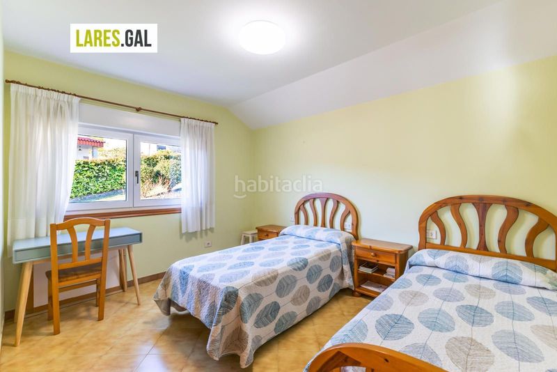 Foto cf960585-b373-4bef-ad39-879efda7cb37. Chalet casa de piedra en serra poñente con jardín en Cangas