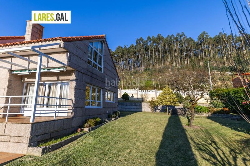 Foto f00e4110-f19c-48a5-8019-213555849f34. Chalet casa de piedra en serra poñente con jardín en Cangas