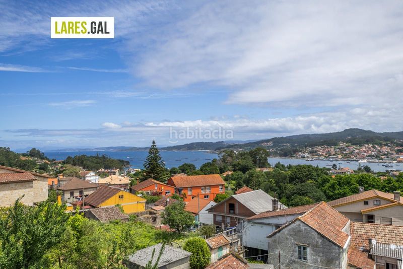 Foto 19a4d2d0-ee00-41ff-952d-2b9f08228d5d. Casa a O Hío Cangas