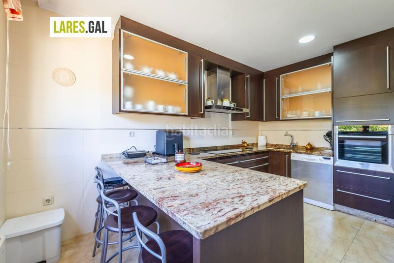 Foto c82b58a6-65bb-4d07-a666-7806a670ef42. Casa adossada amb calefacció aparcament a Darbo Cangas
