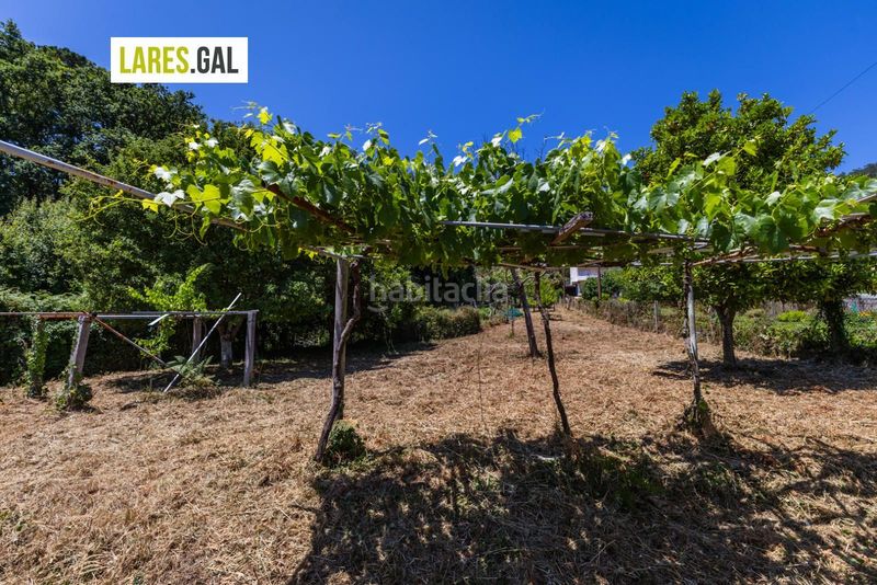 Foto 034f894e-d122-4268-95a5-59eab1252dfb. Finca rústica parcela a la venta en Darbo Cangas