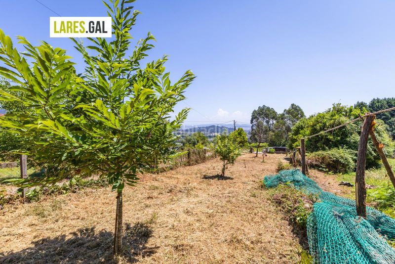 Foto 468fdbc2-975b-41c3-8c0f-c6c5244c19a1. Finca rústica parcela a la venta en Darbo Cangas