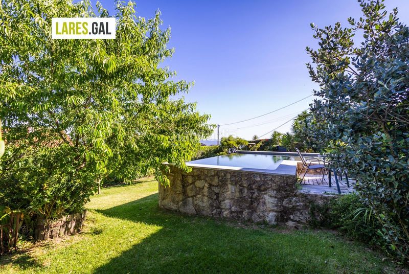 Foto be53fb9e-12d9-465c-82c3-1dc1e15cf824. Xalet amb calefacció aparcament piscina a Moaña