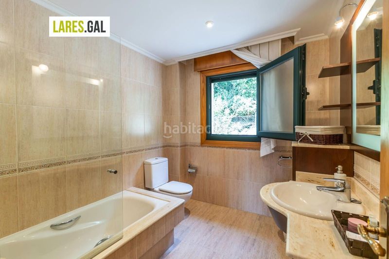 Foto 75e2ca4f-d2a0-4215-a226-ddcfb75deb8c. Casa amb calefacció aparcament a Darbo Cangas