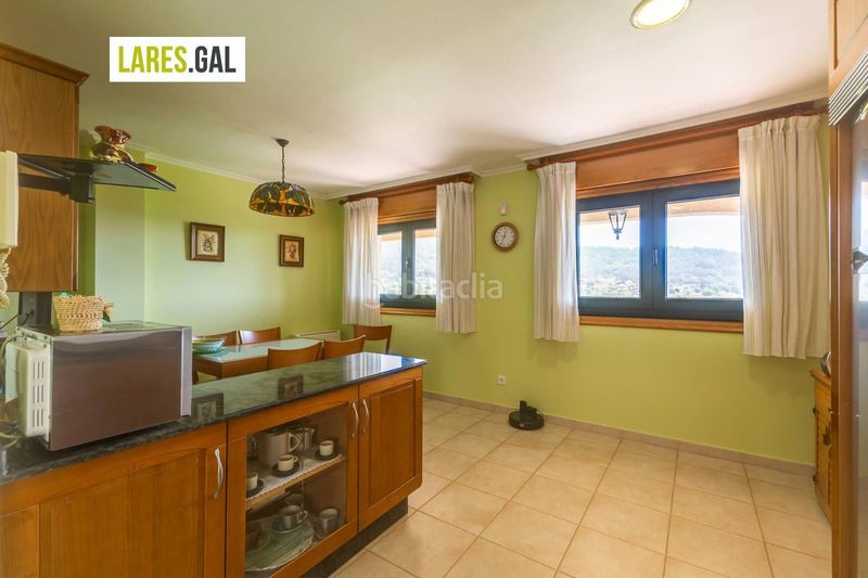 Foto aec8f7cc-8d23-48fc-a30b-59b3e0e72951. Casa amb calefacció aparcament a Darbo Cangas