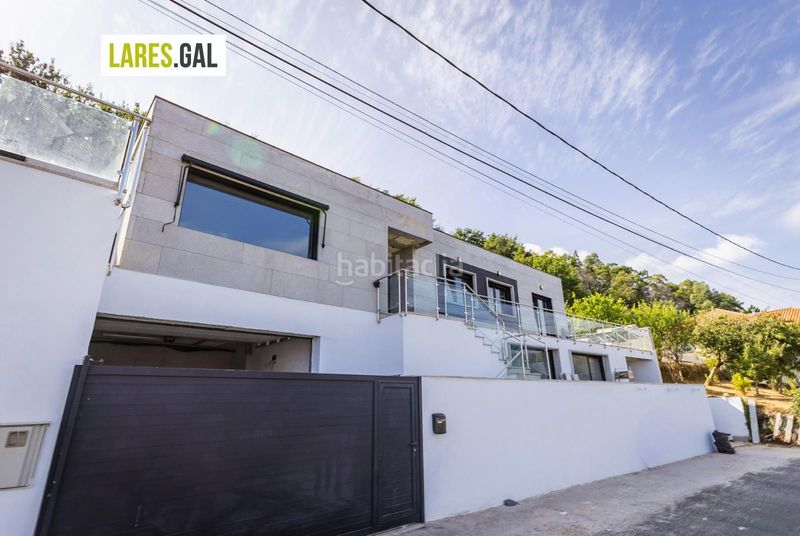 Foto f9dec35a-0296-483a-af30-cf1344d99227. Casa amb calefacció aparcament a Darbo Cangas