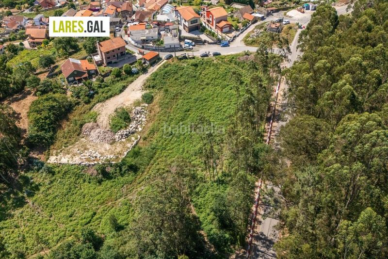 Foto 5c004914-34bc-474b-97f8-36411f59eea0. Finca rústica parcela a la venta en Darbo Cangas