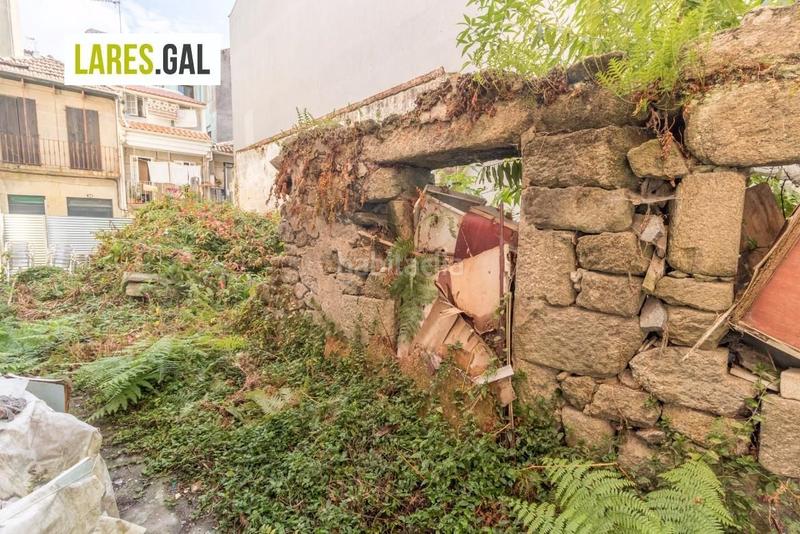 Foto dc229488-ffbe-4534-b081-492a6006cc43. Finca rústica terreno con proyecto y licencia en el casco viejo en Cangas