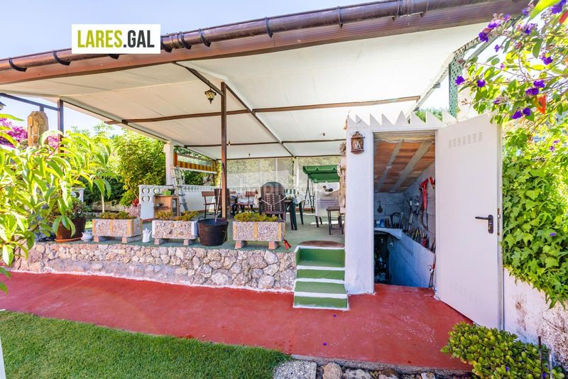 Foto 579d3907-b62a-48a1-b635-43f7a882e7cd. Casa amb aparcament a Darbo Cangas