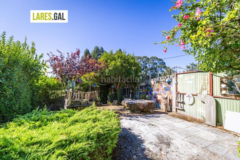 Foto a5b80e41-841a-4ade-9aa5-e5a9a8a58c35. Casa amb aparcament a Darbo Cangas