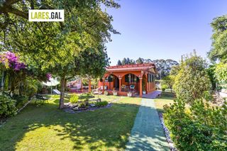 Casa  Recanles. Casa de planta baja con jardín en sta. marta, cangas