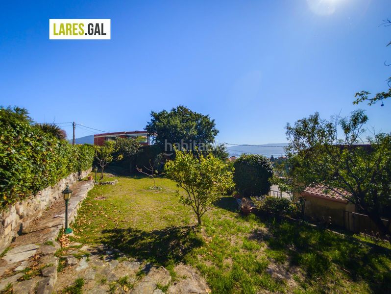 Foto a04a4886-32cf-45a8-8641-57ada943d19f. Casa amb aparcament a Moaña
