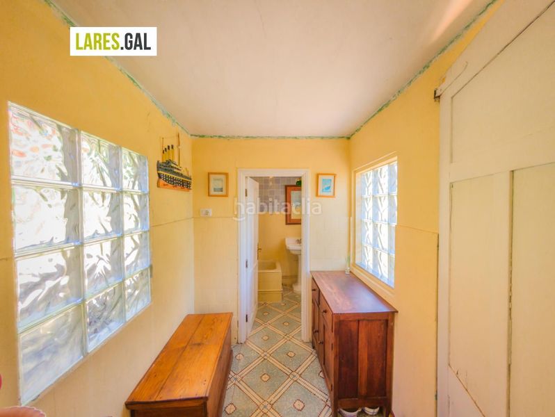 Foto b92a4d2f-c1e2-4c56-829a-e58a67cc7663. Casa amb aparcament a Moaña