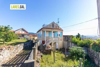 Casa  Paraso (ntrase por atrs). Casa cerca del centro de cangas