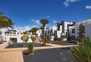 Affitto Appartamento in Puerto del Carmen. Alquiler frente al mar con piscina comunitaria  2 dormitorios
