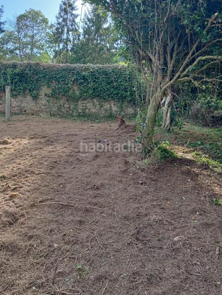 Foto f6f9fe22-c18c-43c9-945e-c722d7bb8453. Terreno residencial en centro de Culleredo Culleredo