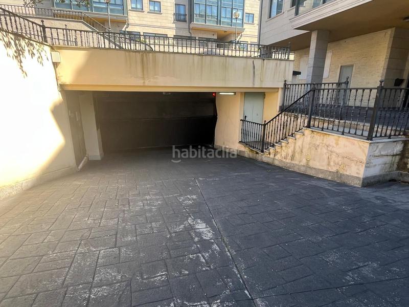 Foto a435d07b-3ba9-4a60-888c-40e9ef2c4055. Car parking in Perillo Oleiros