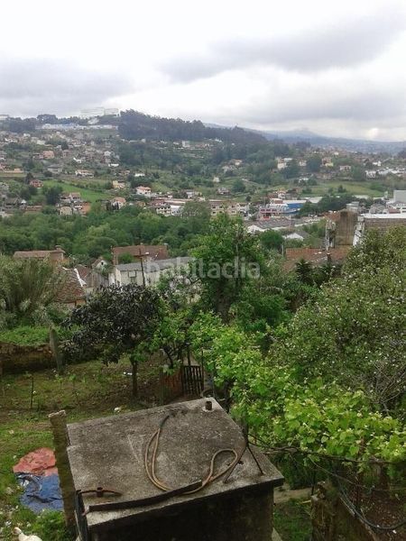 Foto 00fff3a6-4837-4273-9960-6fcfa1490c86. Casa aparellada amb aparcament a Lavadores Vigo