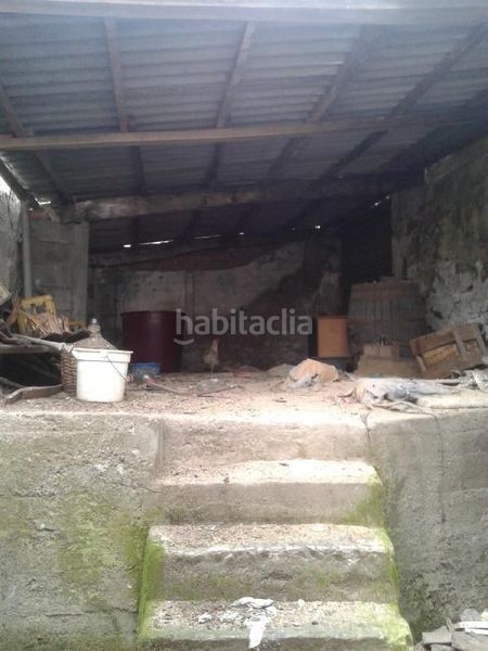 Foto 14f9558d-24b0-4008-bbfb-1dbdccfec3e6. Casa aparellada amb aparcament a Lavadores Vigo