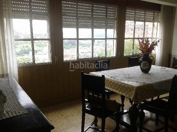 Foto 3b95f96b-44e5-4e37-8132-605bd539901c. Casa aparellada amb aparcament a Lavadores Vigo