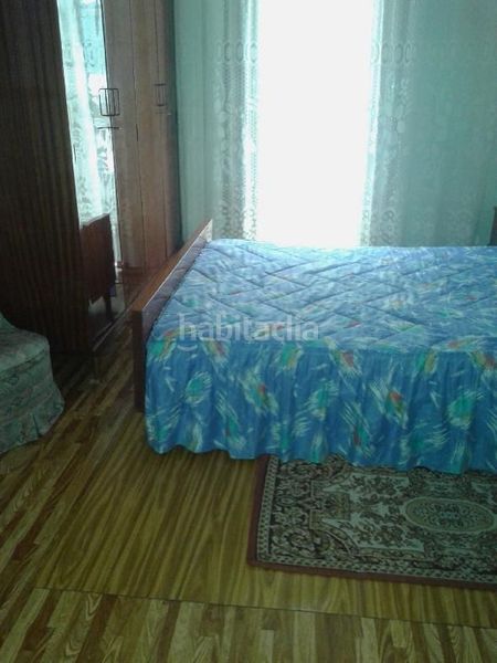 Foto 3d4ef69d-7e2f-40b1-b503-7d285ab0bca1. Casa aparellada amb aparcament a Lavadores Vigo
