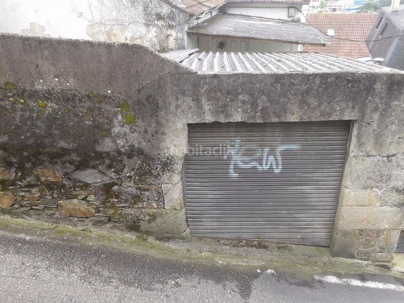 Foto e3879293-63d4-4c74-8550-611cb6f32311. Casa aparellada amb aparcament a Lavadores Vigo