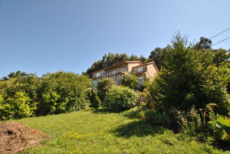 Foto 9ff0ae67-61b2-4d25-aa23-97edd985368c. Casa  con finca en Darbo en Darbo Cangas