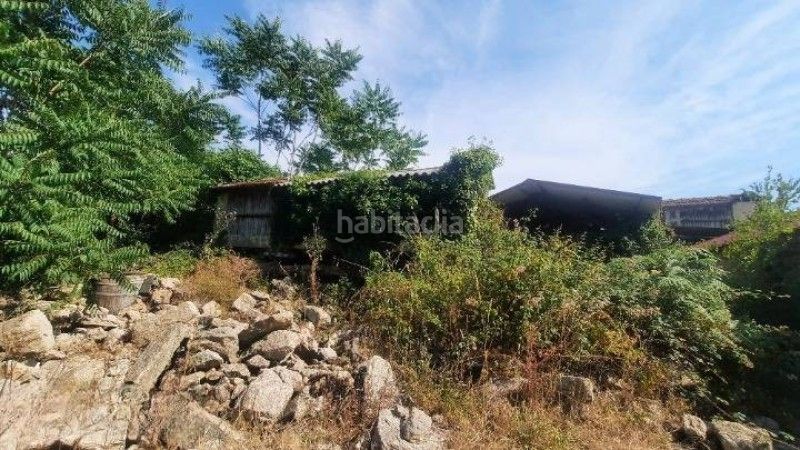 Foto 314b4cff-3361-4d2e-9766-22db0ce85cd6. Casa aparellada a Covelo (O)