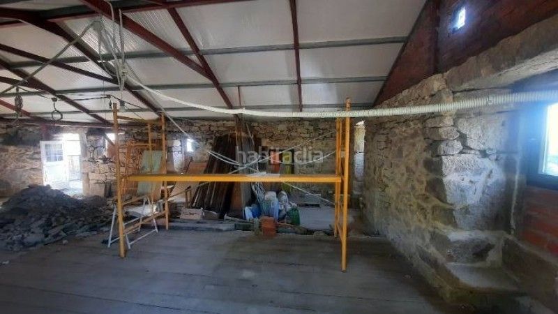 Foto 74d213aa-7440-4fe0-9b6a-2f7c99e278c5. Casa aparellada a Covelo (O)