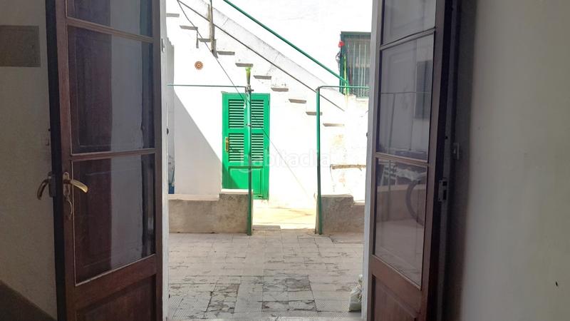 Foto 80763a2d-2c9f-438f-b465-21dab1295937. Casa bifamiliare con camino in Sóller