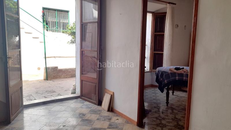 Foto dc60cfad-7363-486a-b3c9-4a76699cf513. Casa bifamiliare con camino in Sóller