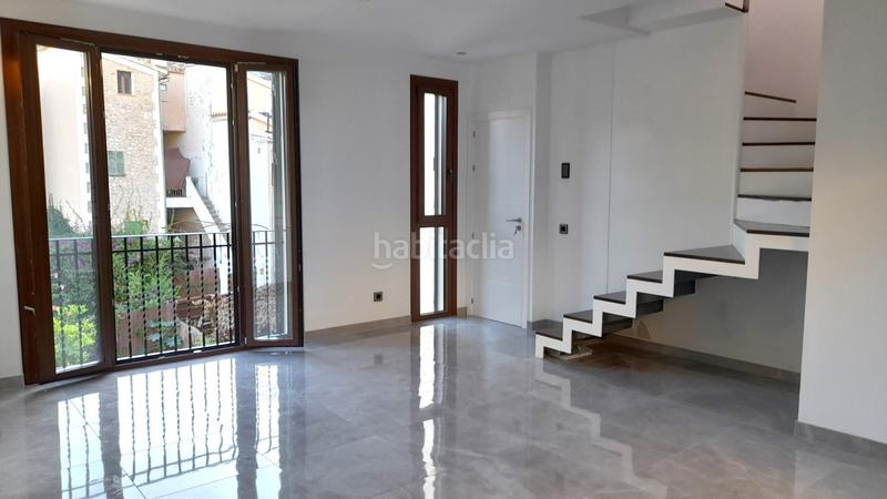 Foto f638e175-a789-4bdc-a1cc-3d8296fdbba8. Casa aparellada amb calefacció aparcament a Sóller