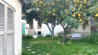 Casa en Sóller. Encantadora casa de pueblo con jardín en sóller
