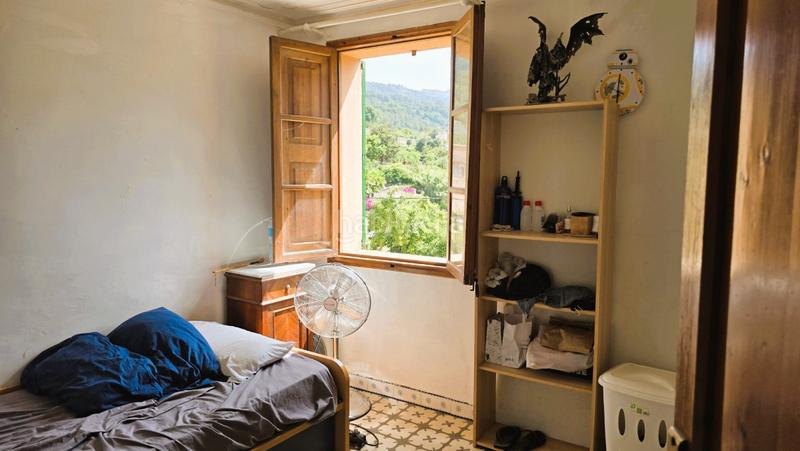 Foto 0f75e184-e4df-4015-9905-8621588cf520. Casa pareada casa con jardín en las afueras en Sóller