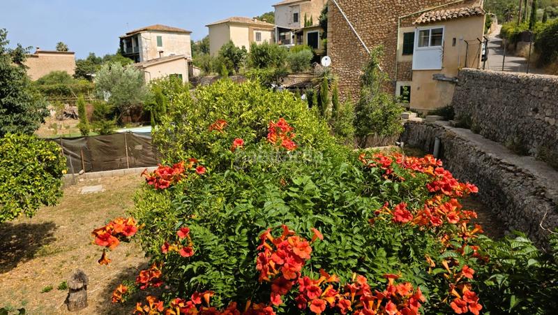 Foto 4cafe960-369e-453b-b1a5-6aa9edbe7d73. Casa pareada casa con jardín en las afueras en Sóller