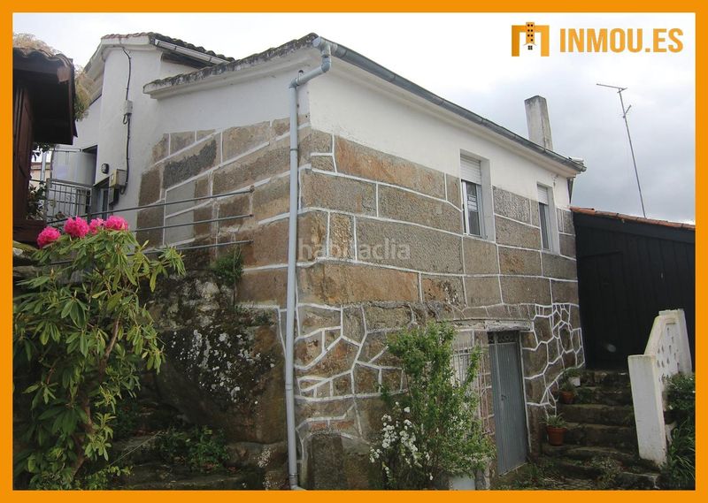 Foto 754a08c0-6104-4354-8916-abd86c57e3ac. Casa adossada a Celanova