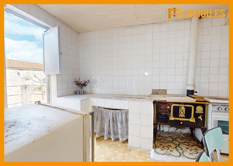 Foto be8f5b0d-3c2c-4e9a-bafc-4191f65ca733. Casa adossada a Celanova
