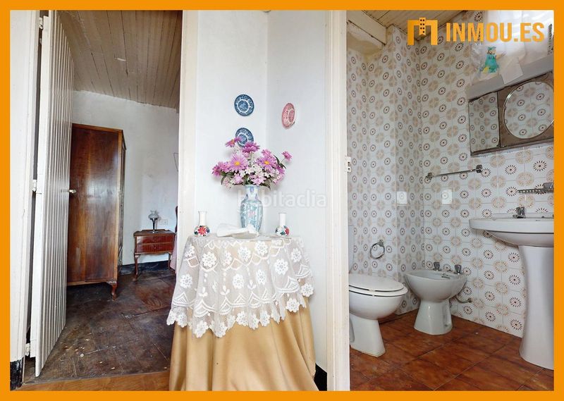 Foto bfc6d194-8279-4c4e-916d-21c422c97ea3. Casa adossada a Celanova
