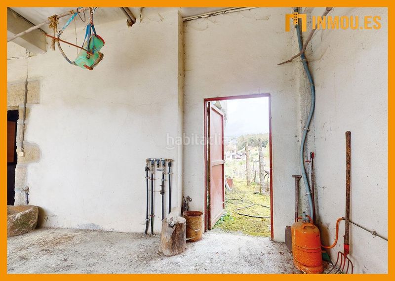 Foto 5345c936-ba79-4c5e-ab07-da672906cd26. Casa amb calefacció aparcament a Castrelo de Miño