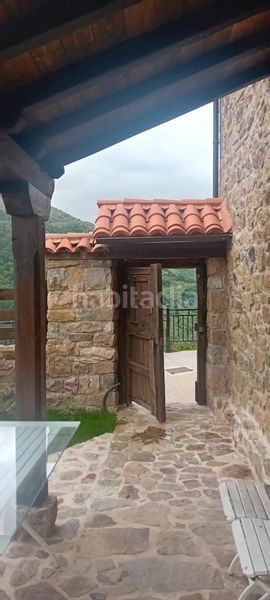 Foto 89477fc7-a73e-4404-b45f-31ada9388058. Casa adossada a Rionansa