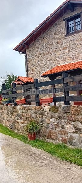 Foto b99cc184-f889-47dd-82d1-c38ed6af5d38. Casa adossada a Rionansa
