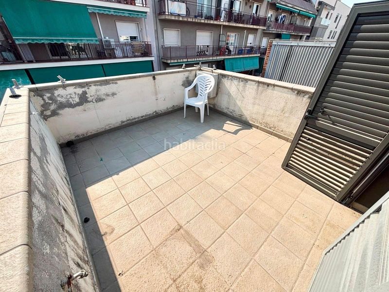 Foto 6a17d45d-7f54-4f8a-8302-cdeec6a36738. Casa amb calefacció aparcament piscina a Centre Granollers