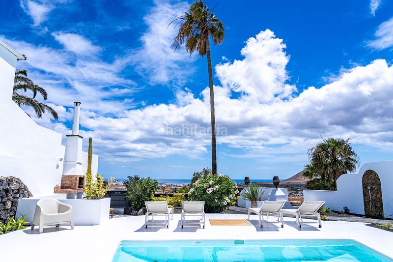 Foto 5ae6dbee-27e3-4130-8bd7-225c23c26226. Casa adossada amb aparcament piscina a Tahiche Teguise